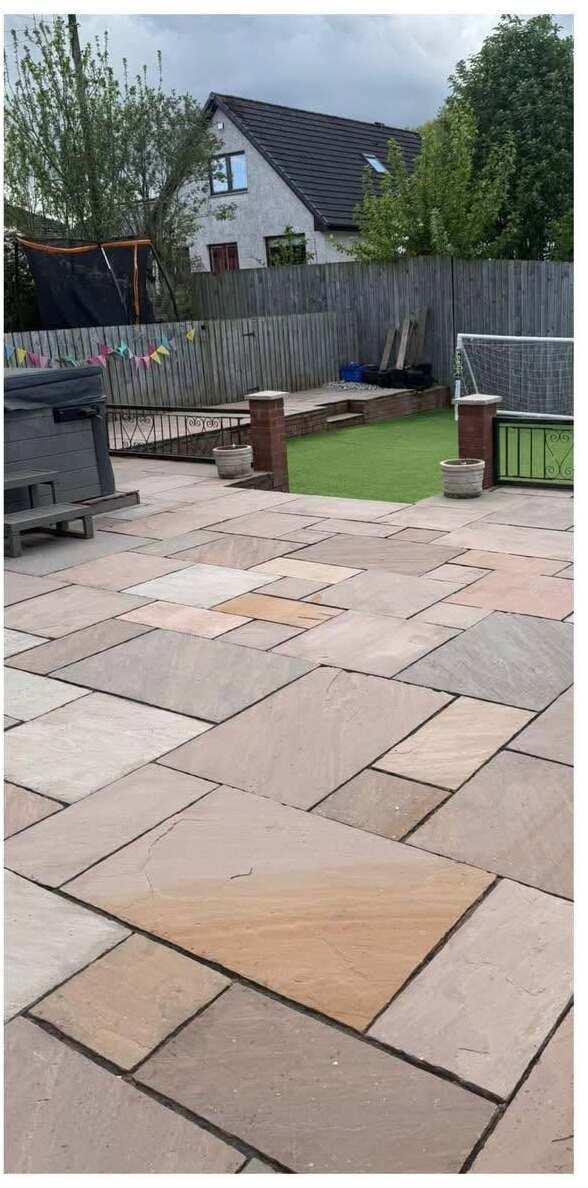 Bright sandstone patio after cleaning