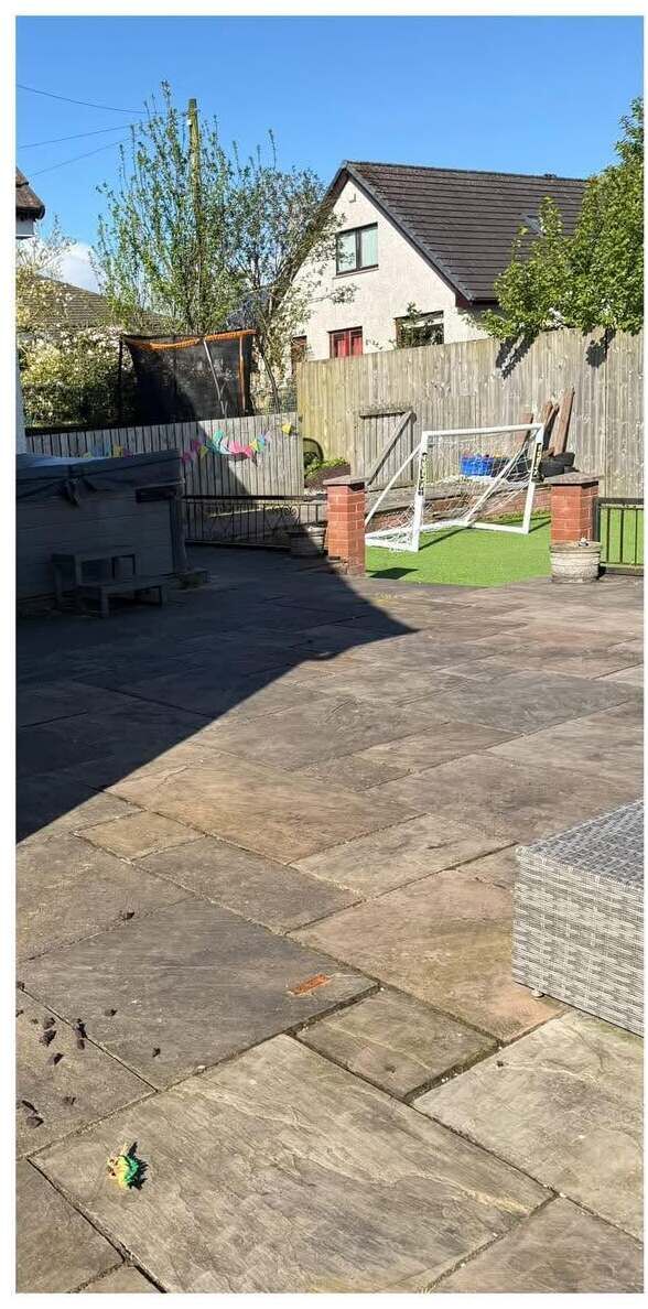 Dark, dirty patio before cleaning